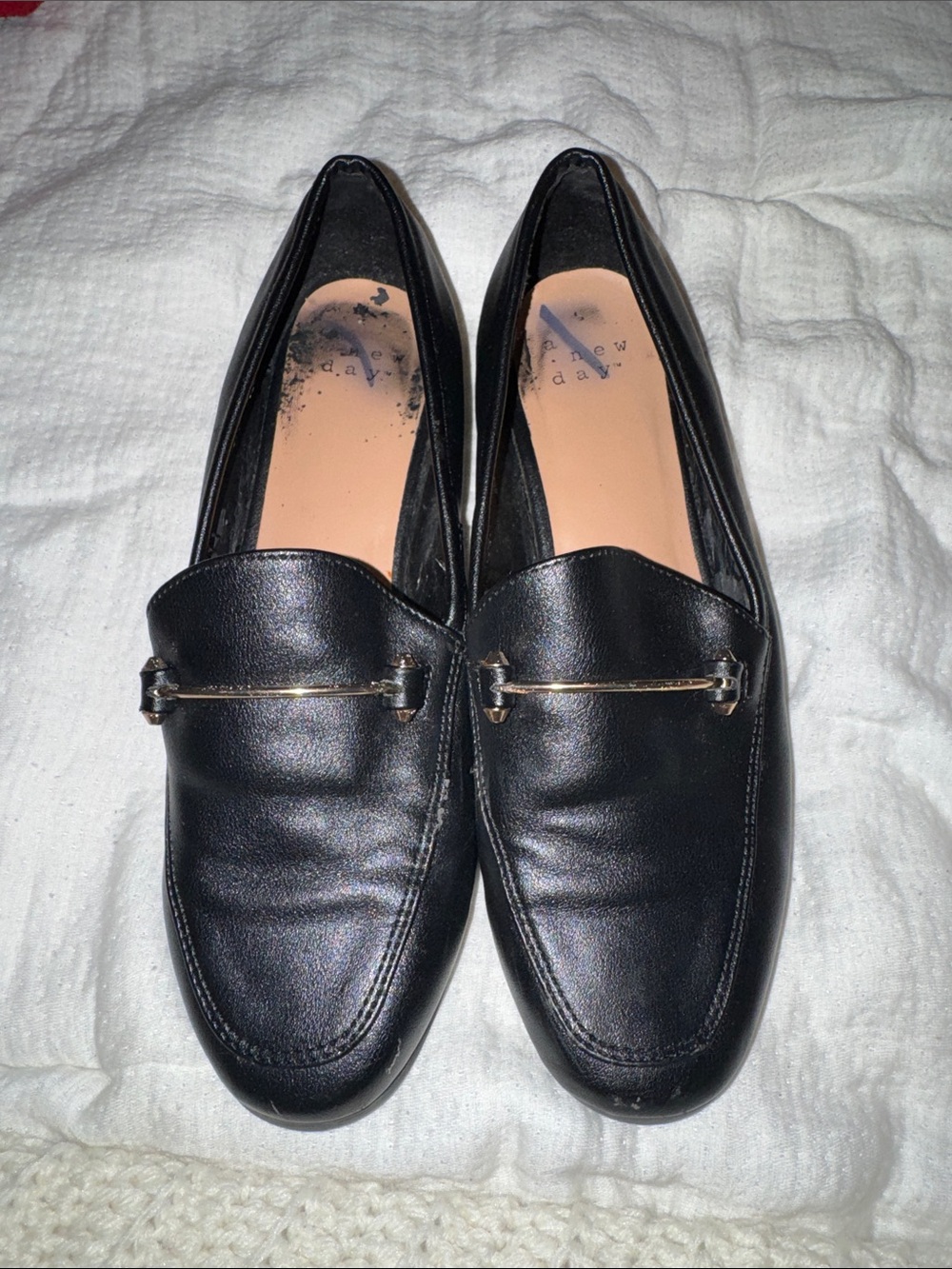 Women's Black Leather Slip-On Loafers with Gold Accent